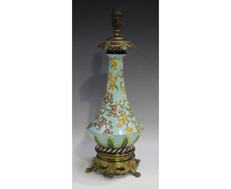 A French Japonaise pottery ormolu mounted table lamp, probably Longwy, the pear shaped body of 'cloisonné' style, decorated w