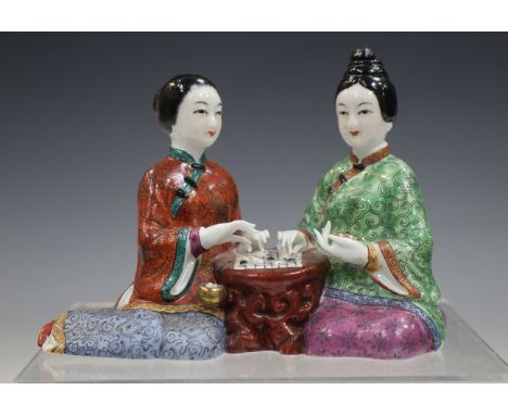 A Samson porcelain figural scent perfume bottle and stopper, late 19th century, modelled in the form of two kneeling Chinese 