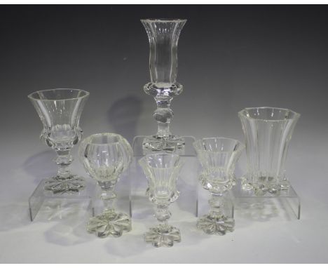 An extensive suite of Belgian faceted cut glass, early to mid-20th century, of octagonal shape with centrally knopped stems a