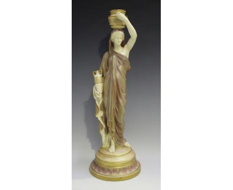 A large Royal Worcester figural Cricklite lamp base, circa 1902, modelled as a Grecian water carrier with two amphorae, decor