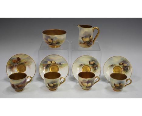 Three Royal Worcester cabinet cups with matching milk jug and sugar bowl, 1919 to 1930, each painted by E. Barker, signed, wi