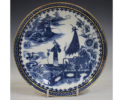 A Caughley blue printed Fisherman pattern saucer dish, circa 1780, with gilt enriched rim, diameter 19cm, an English Delft pl