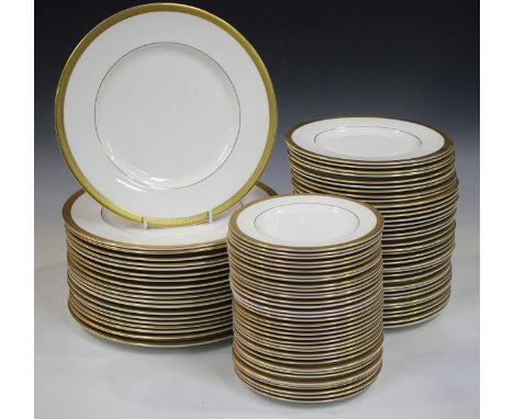 A Royal Doulton Royal Gold pattern part service, comprising twenty dinner plates, thirty-six dessert plates, thirty-six tea p