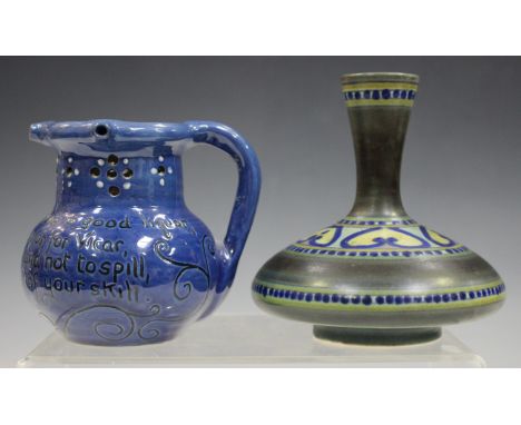 A Brannam pottery blue glazed puzzle jug, late 19th century, inscribed with verse beneath the pierced neck, incised marks to 