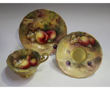 A Royal Worcester porcelain fruit painted trio, circa 1926, painted by Moseley, signed, with gilt detail, puce printed factor