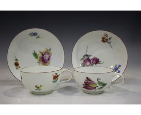 A small group of Meissen porcelain teawares, painted with Deutsche Blumen, 18th and early 19th century, comprising a pair of 