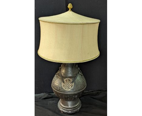 A large Chinese style lamp with shade