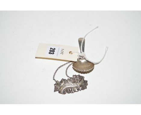 A silver whisky decanter label, by George Unite, Birmingham 1837; together with a silver caddy spoon with shell pattern bowl.