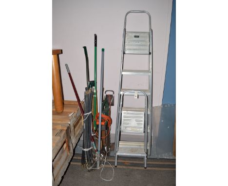 Two sets of aluminium step ladders; an electric hedge cutter; various tools; etc.