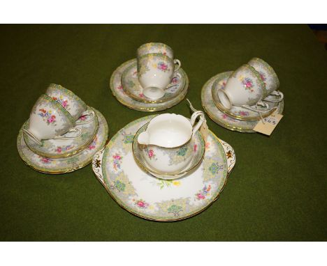 A Shelley tea set; 'Georgian' pattern, no. 13360, comprising: six cups, saucers, plates, cream jug and sugar bowl, and one ca