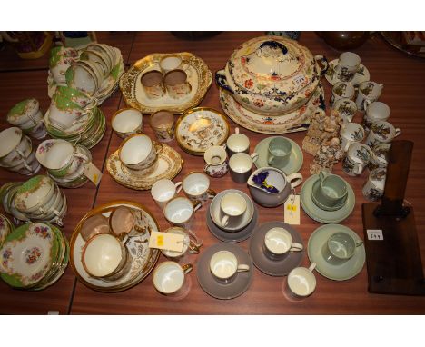 A Paragon 'Rockingham' part tea service, comprising sandwich plates, teacups and saucers, tea plates; a Victorian part tea an