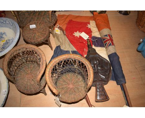 A pair of carved oak bellows; a leather riding crop by Eegee; large size wicker doll's furniture, comprising: a pair of chair