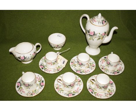 A Wedgwood 'Hathaway Rose' pattern coffee set, comprising: six coffee cans and saucers, a coffee pot, cream jug and sugar bow