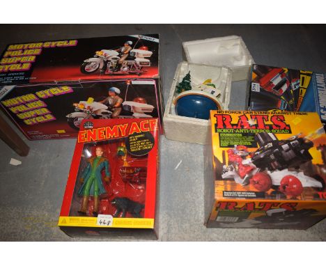 A Thundering Tomy Tronic 3-D electronic game; a Tomy Robot Anti Terror Squad Star Shooter; a Motorcycle Police Supercycle; et