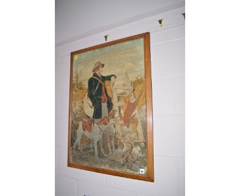 An early 20th Century needlepoint tapestry depicting a keeper with dogs and game, 68 x 81cms, in oak frame.