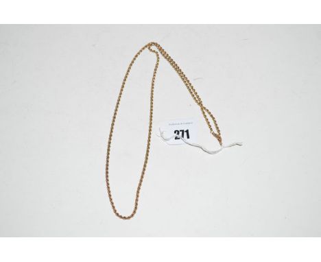 A yellow metal twist pattern chain necklace.