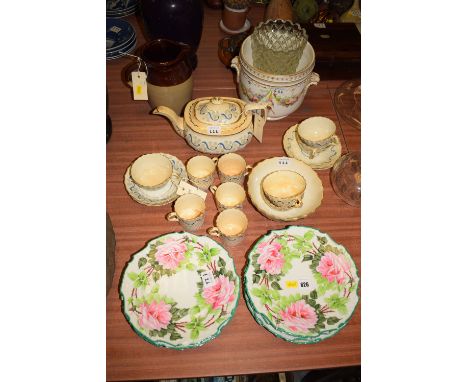 A set of Wemyss style cabinet plates, mark to base, rose decoration with shaped sides; an early 19th Century part tea and cof