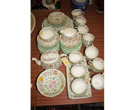 A Minton 'Haddon Hall' pattern part breakfast/tea set, to include: tea plates, bread plates, cups and saucers, teapot, sugar 