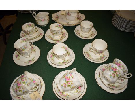 A Royal Albert 'Moss Rose' twelve piece tea set (one saucer missing but one extra cup).