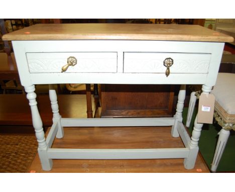 An elm later painted two drawer low side table, w.78.5cm; together with an upholstery topped stool on fluted tapering support