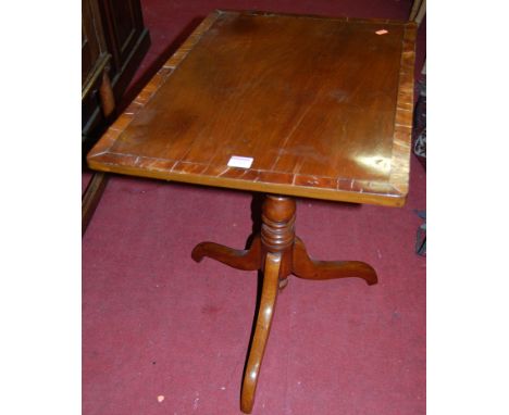 A 19th century mahogany and crossbanded rectangular tilt-top pedestal tripod table, w.61.5cm