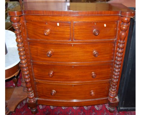 A Victorian Scottish mahogany bowfront chest of two short over three long drawers, within bobbin turned columns, width 112cm