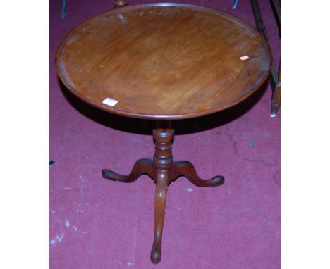 A 19th century mahogany circular dished tilt-top pedestal tripod table, dia.60.5cm.Catch is working but is not original.With 