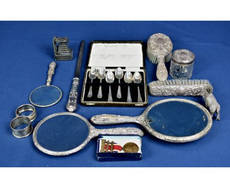 A silver dressing table set and quantity of collectables comprising of two mirrors; hairbrush; clothes brush; two napkin ring