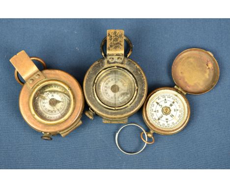 Two World War One marching compasses both by T.G.Co Ltd, MKIII, the first dated 1943, No B223795, the second dated 1944, No B