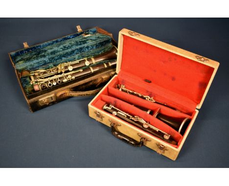 A vintage F. Buisson clarinet and a Console clarinet -both cased. (2)  