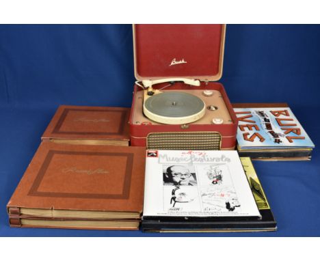 A 1960s Bush RP.20 portable record player with Garrard tonearm and turntable, together with a collection of 78 records inc. c