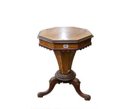 A 19th century trumpet shaped sewing /work table the hinged lid lifting to reveal original interior, supported on tripod cabr