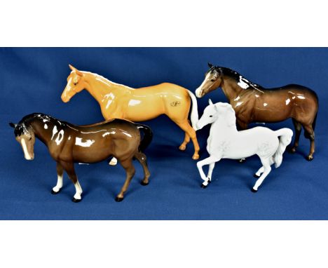 Four Beswick horses, one a/f. 