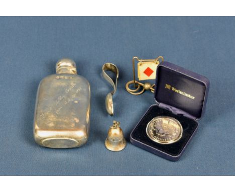 A collection of silver smalls comprising of a silver hip flask by A &amp; J Zimmerman Ltd, Birmingham, 1896, inscribed; Chris