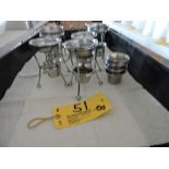 Stainless steel butter dishes.