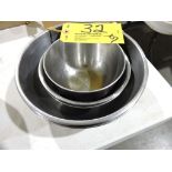 Smaller stainless steel mixing bowls.