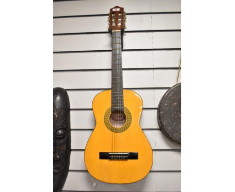 A junior sized classical guitar, by Stagg
