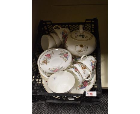 A collection of Wedgwood 'Sandon' tea wares including teapot, cups and saucers and sugar basin, having flower and insect tran
