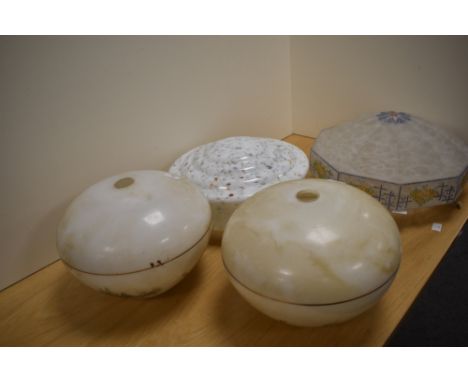 Four vintage glass light shades, including an art deco white multi-coloured platonnier shade, a patterned nonagon platonnier 