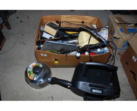 A "Sony" CD player, bedside clocks, Thermos, etc.