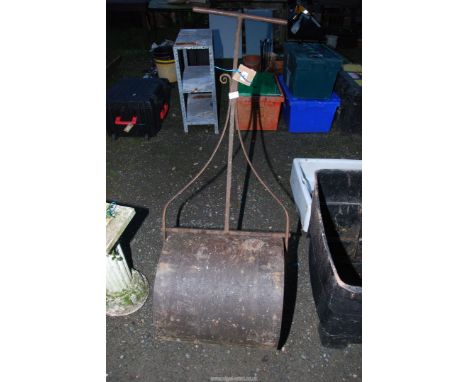 A cast iron roller.