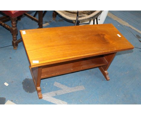 An occasional table with lower shelf, 36" x 14 1/2" x 18" high.