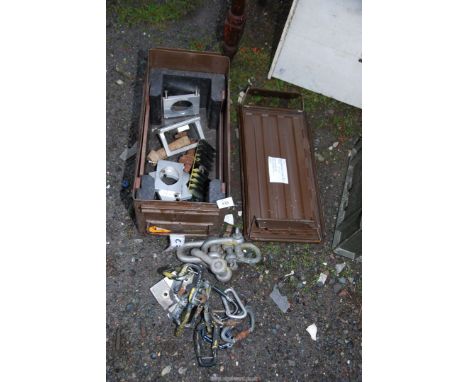 D shackles and connectors in an ammunition box.