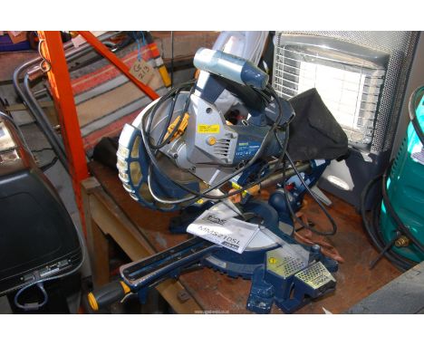A MacAllister 1300w MMS21OSL compound mitre saw.
