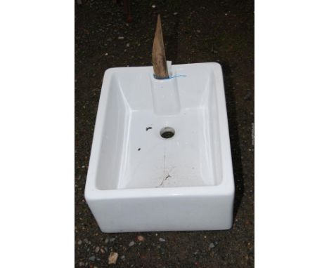 A Belfast sink, 18" x 23 1/2" x 10" high.
