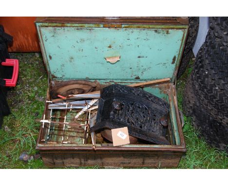 A metal trunk and contents, fire front, tree stand etc.