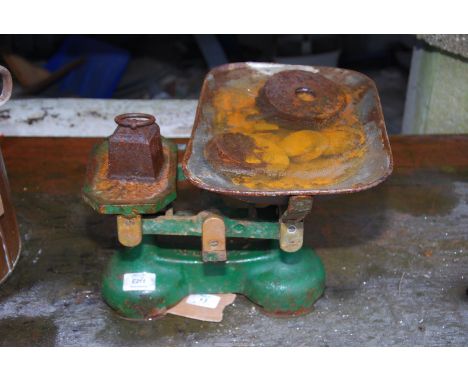 A balance scales with weights.