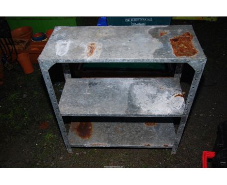 A 3 tier galvanised shelf unit.