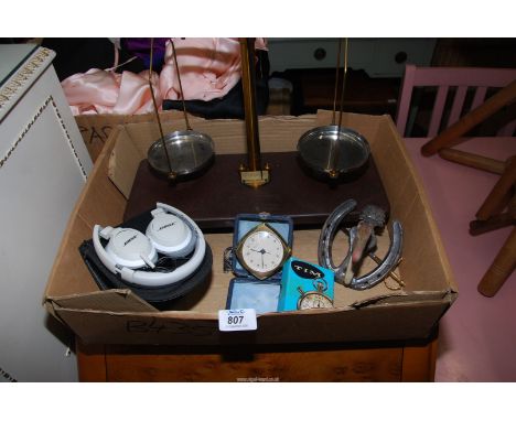 A postage scales, a base head phones, etc.