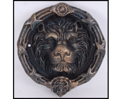 A vintage style, 20th century cast iron lion's head door knocker. Measures 28cms wide.&nbsp;